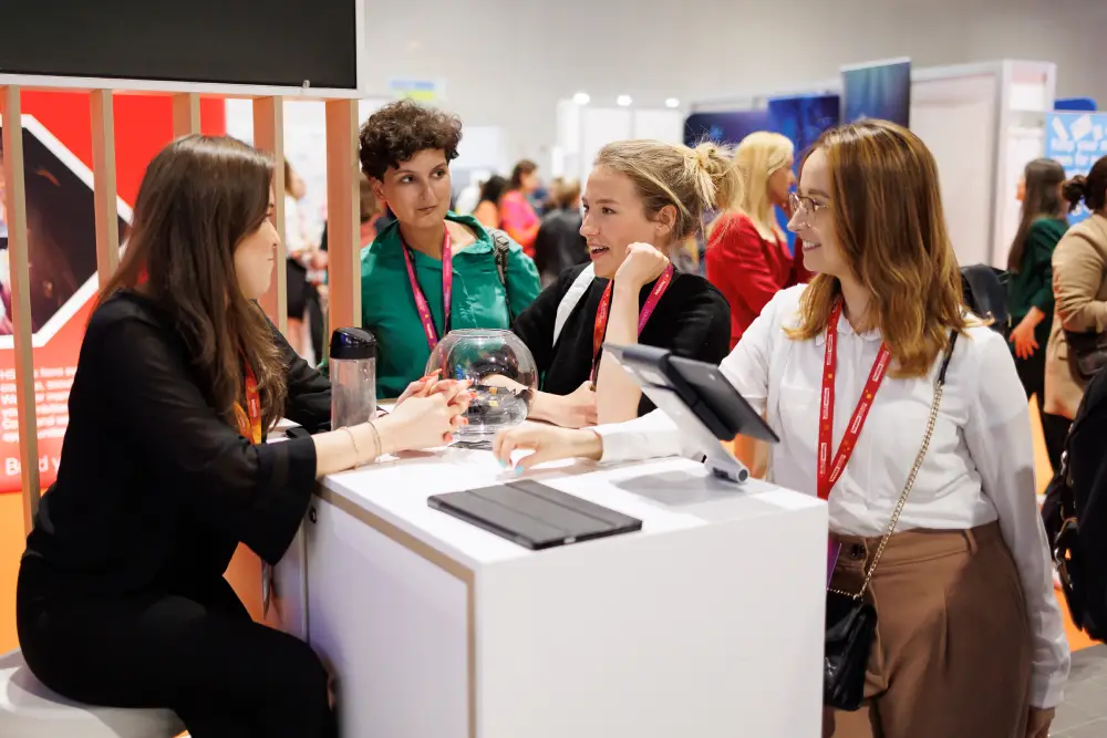 Women in Tech Summit speaker with microphone